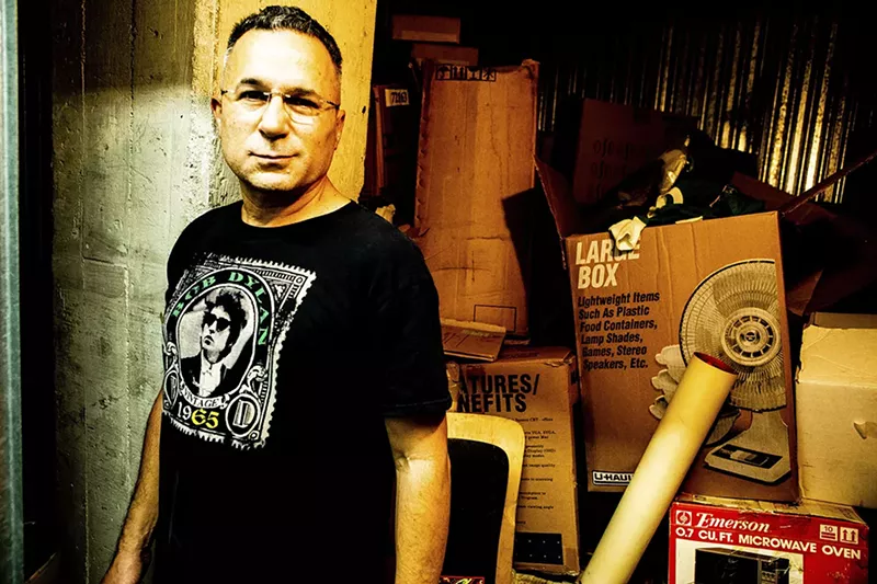 Image: Placebo Records co-founder Tony “Tony Victor” Beram at the Phoenix locker where he stored the label’s memorabilia.
