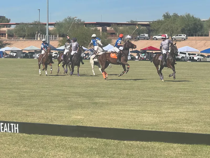 Image: Players from competing teams clash in an intense championship polo match Friday at the 13th Bentley Scottsdale Polo Championships.