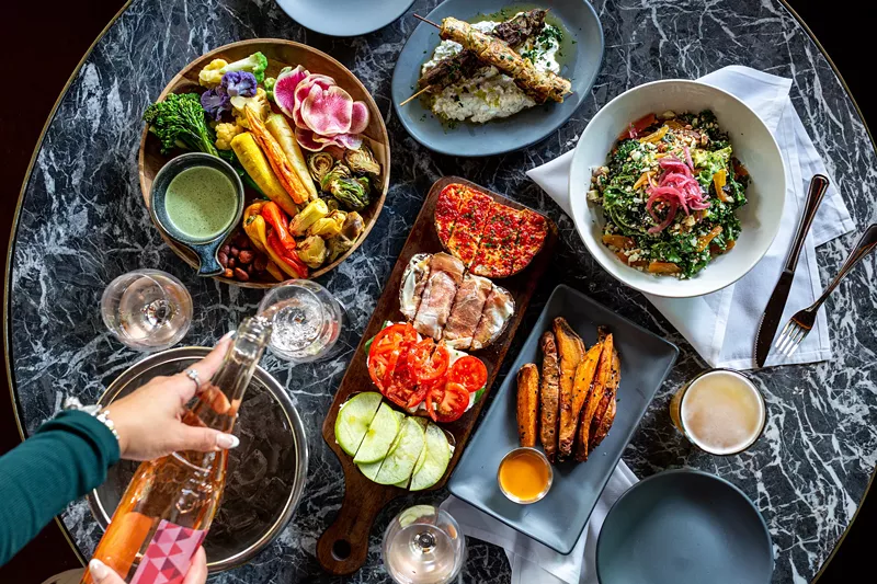 Image: Postino WineCafe, which serves a menu of bruschetta boards, sandwiches, salads and snacks to pair with wine, has opened its first West Valley location in Peoria.