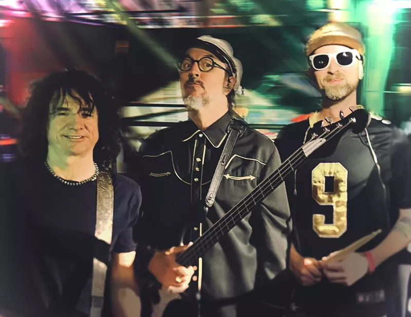 Image: Larry LaLonde, left, Les Claypool, center, and John Hoffman of Primus.