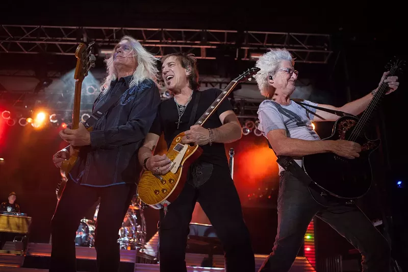 Image: REO Speedwagon during a 2015 concert in Phoenix.