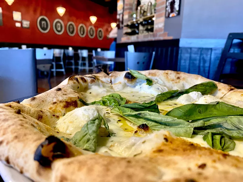 Image: La Piazza's Roman and Neapolitan pizzas, such as its Bianca Pizza, gained fans locally and beyond. The restaurant was featured on Food Network's "Diners, Drive-Ins and Dives" four times.