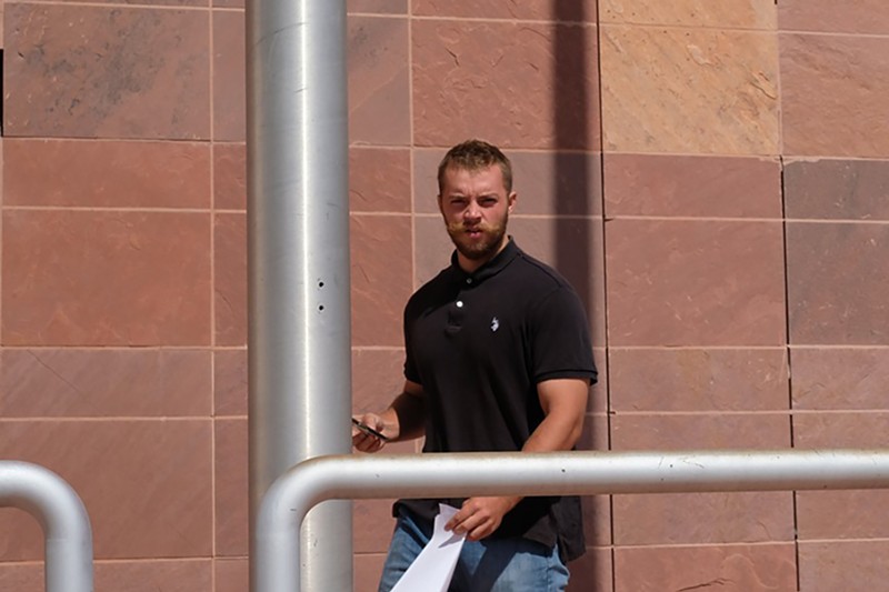 Ethan Schmidt-Crockett left the courthouse after being arraigned Wednesday.