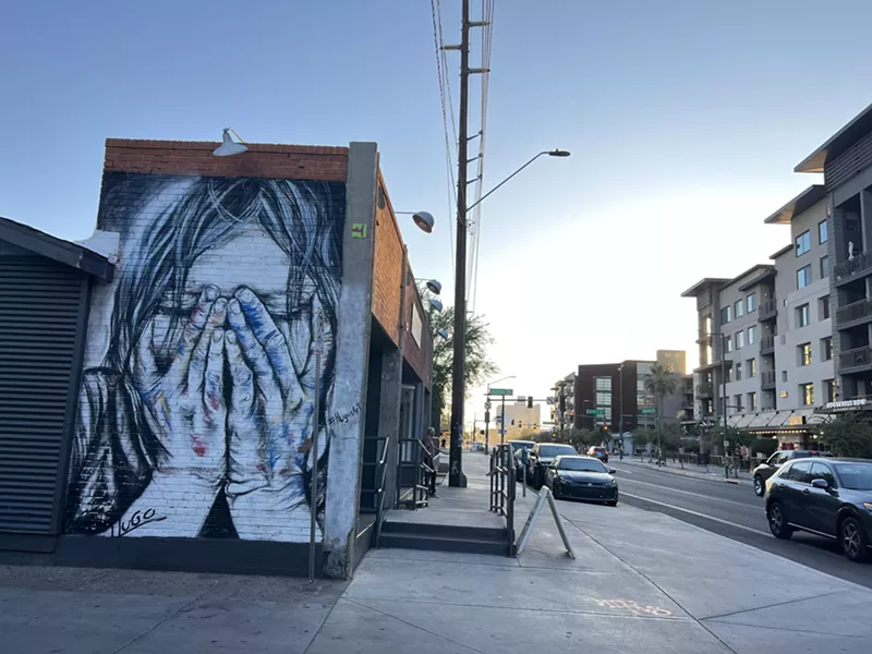Image: Hugo Medina's mural depicts an artist reacting to changes in the Roosevelt Row arts district.