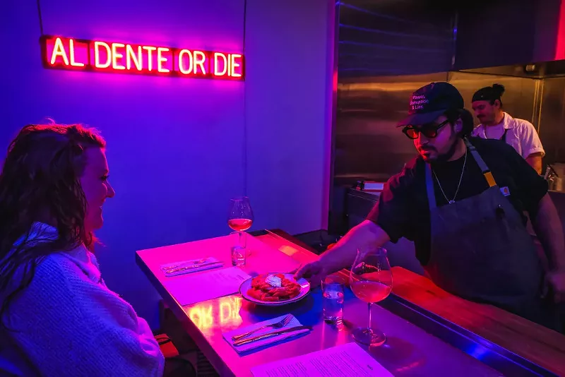 Image: Chef and owner Racan Alhoch serves Rigatoni Vodka with a chicken cutlet and ricotta at Saint Pasta. The restaurant opens this week.