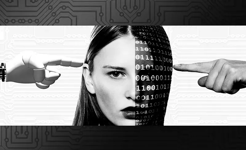 Image: The face of a woman, half of it covered in binary code. On one side, a robot hand points at her head. On the other, a human hand does the same.