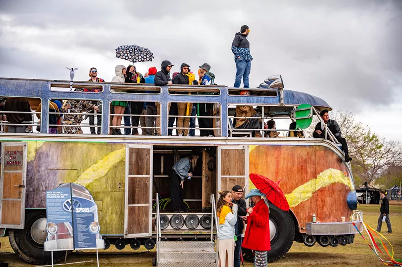 Image: Fans pose on the Walter the Bus during M3F Fest 2025.