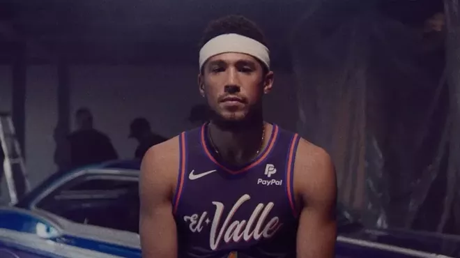 Devin Booker wearing El Valle jersey