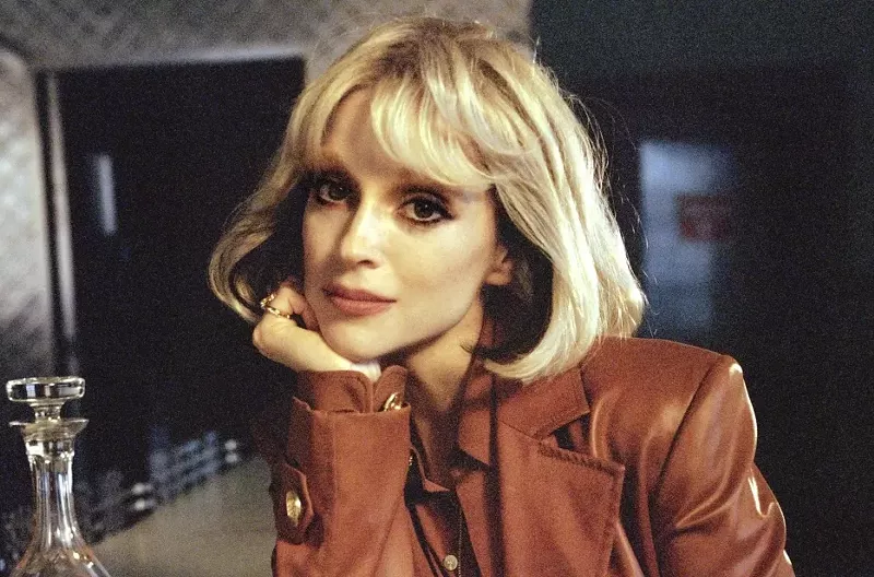 Image: A blond woman.