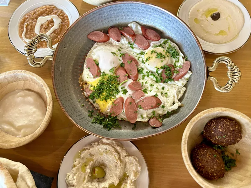 Image: The menu at Rayoog Cafe has a wide selection of dishes. The Arabic Way, a sampler breakfast perfect for sharing, allows you to try many dishes at once.