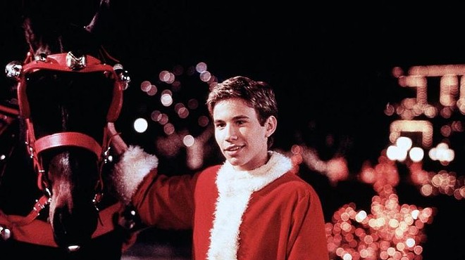 Actor Jonathan Taylor Thomas in a Santa suit.