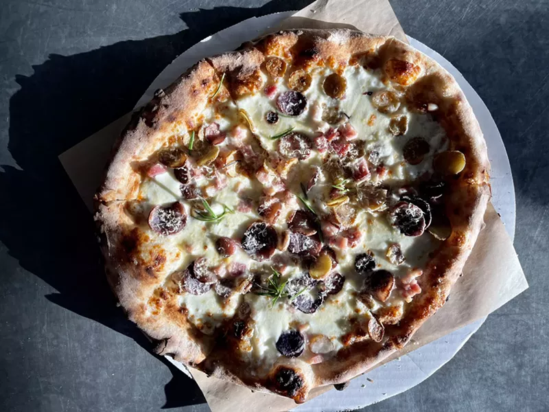 Image: Potatoes add an unusual texture to this signature pie at Myke's Pizza.