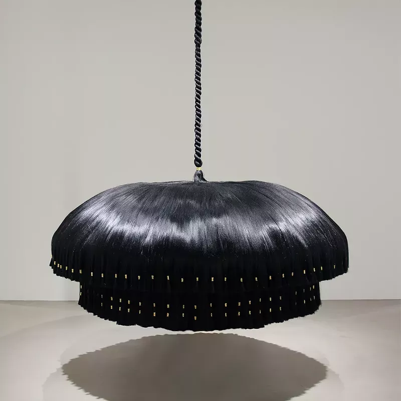 Image: Merryn Omotayo Alaka and Sam Fresquez, Double Take, 2021. Kanekalon hair and braid clamps, steel, wire, 81 × 59 × 59 inches.
