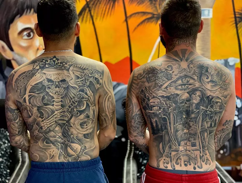 Image: Back tattoos by Smiley of Smiley Ink Tattoos in Mesa.