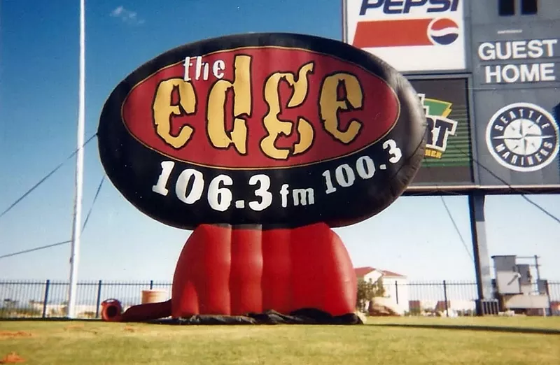 Image: An inflatable version of The Edge's logo on display during That Damn Show at Peoria Sports Complex in 1999.