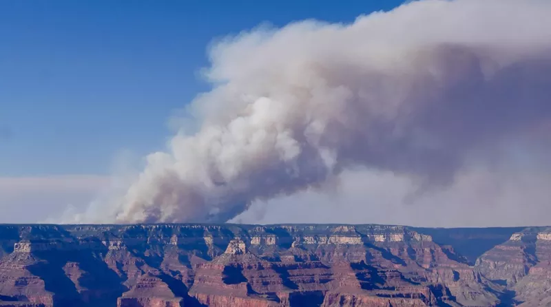 Image: smoke billows above the grand canyon