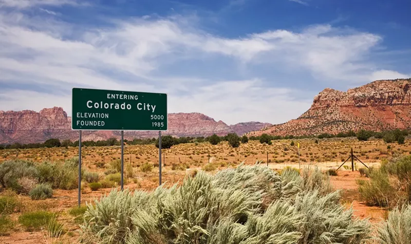 Image: a highway sign for colorado city