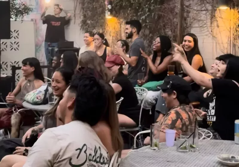 Image: Fans watch "Love Island" at Gracie's Tax Bar.