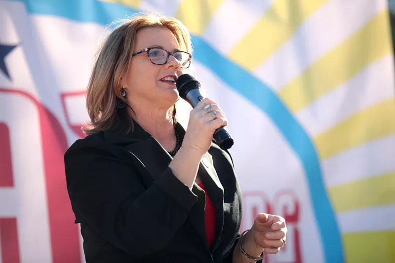 Image: State Senator Kelly Townsend speaks with attendees at a rally hosted by EZAZ at Wesley Bolin Memorial Plaza at the Arizona State Capitol in Phoenix.