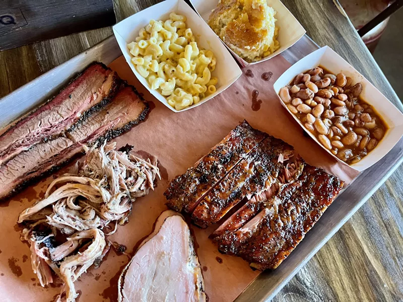 Image: A loaded tray from Caldwell County BBQ in Gilbert. The Texas-style smokehouse is adding two new Valley locations in 2026.