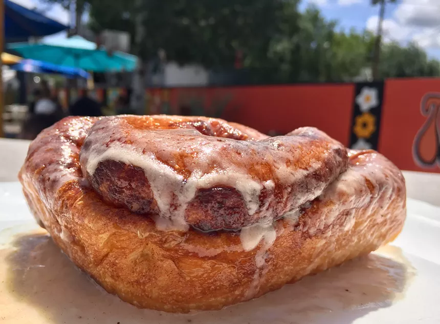 The Giant Cinnamon Roll at The Toasted Owl Cafe. - ALLISON YOUNG