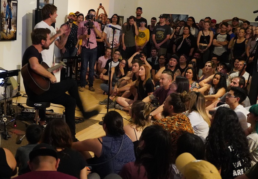 A crowd sings along with Circa Survive during a 2019 concert. - LYNN TRIMBLE