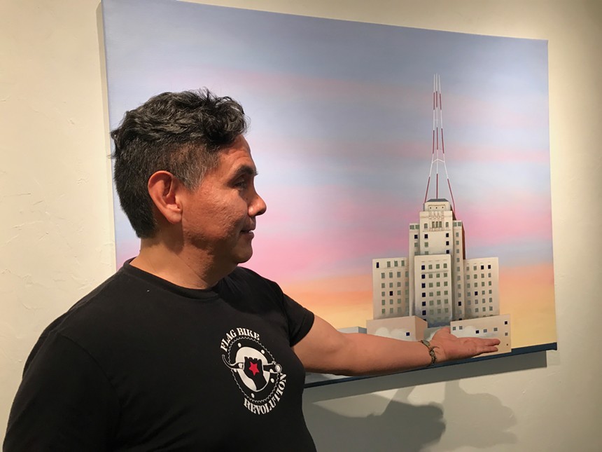 Rafael Navarro with one of his artworks at The Lodge Art Studio. - LYNN TRIMBLE