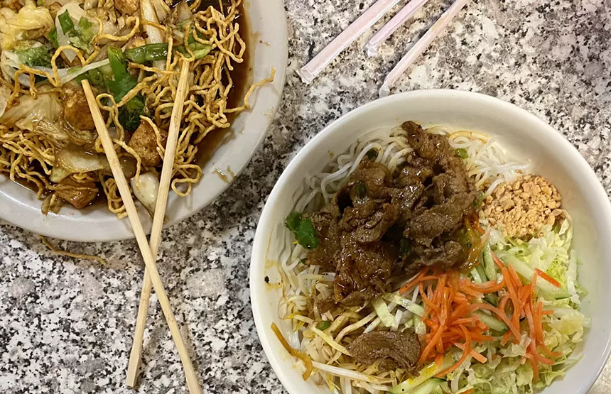 An order of #17, crispy egg noodles with tofu and veggies, and #52, a rice noodle and BBQ beef feast. - ALLISON YOUNG