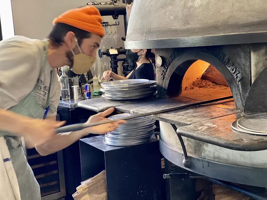 Anello chef-owner Scott Girod and his Stefano Ferrara oven from Naples, Italy. - ALLISON YOUNG