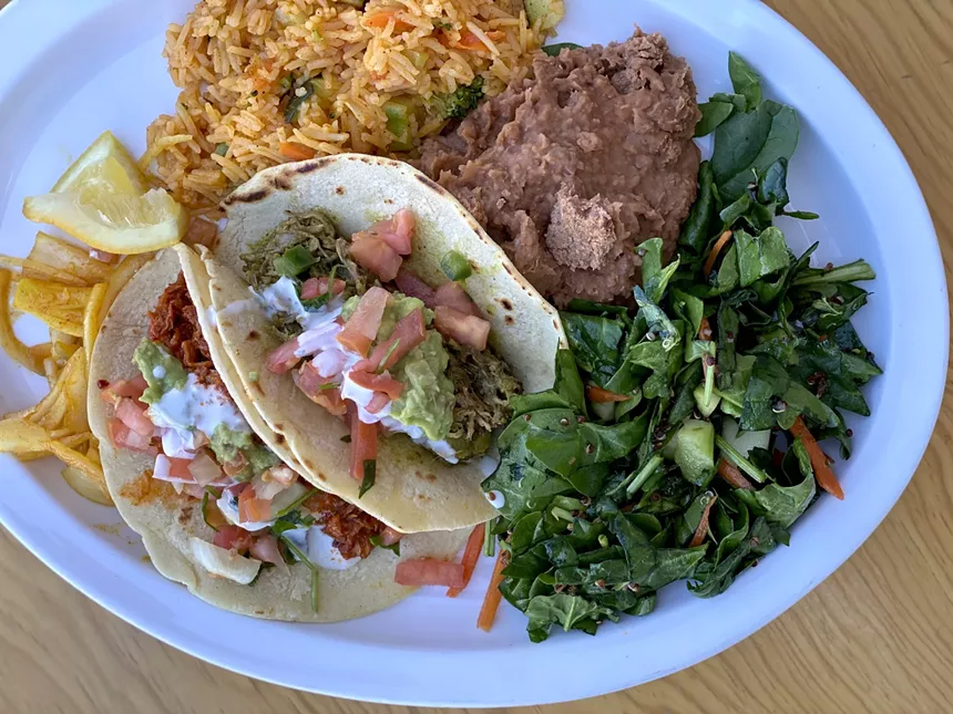 A colorful plate of jackfruit tacos at Tucson's Tumerico Cafe. - ALLISON YOUNG