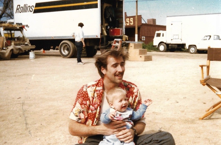 Nicolas Cage holding TJ Kuhn behind the scenes at Reata Pass Steakhouse in Scottsdale. - COURTESY OF JULIE ASCH KAREUS
