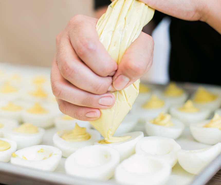 The making of some deviled eggs, perfect for Easter. - EAT BY STACEY WEBER