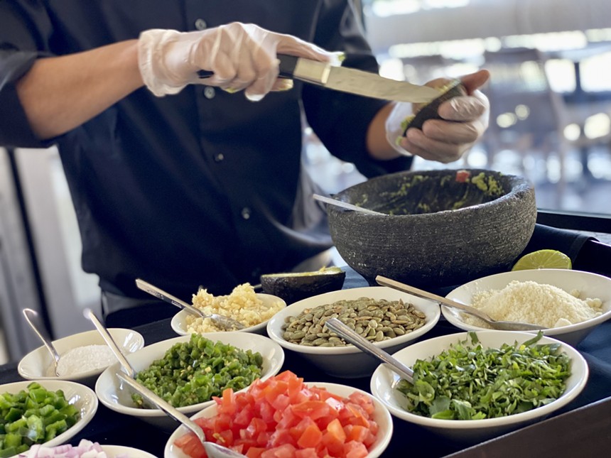 The tableside guacamole at The Mission is a spectacle to savor. - ALLISON YOUNG