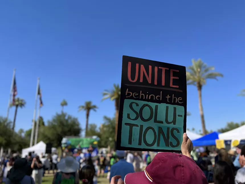Activists are begging Kyrsten Sinema, the U.S. Senator from Arizona, to help reintroduce and pass President Joe Boden's Build Back Better Act before Memorial Day. - ELIAS WEISS