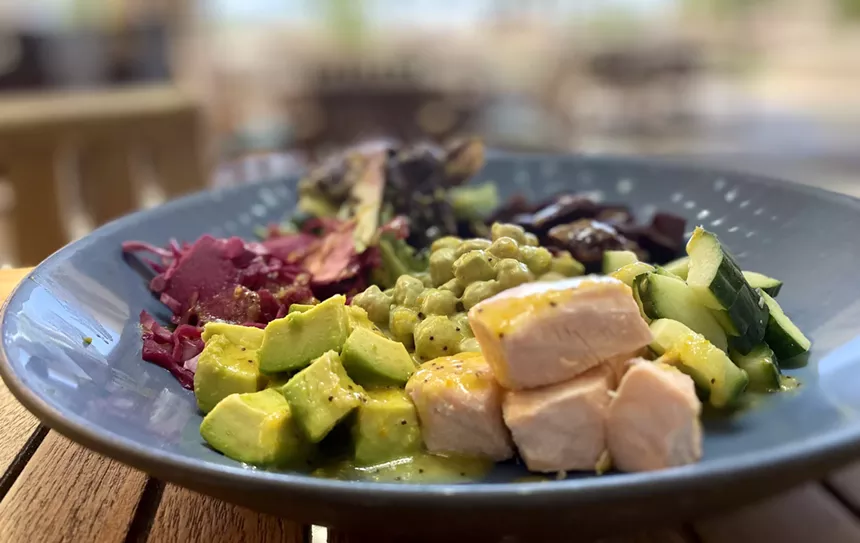 Mowry & Cotton serves a citrusy salmon and chickpea dish. - ALLISON YOUNG