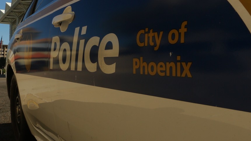 Phoenix police are set to get huge pay raises. - SEAN HOLSTEGE