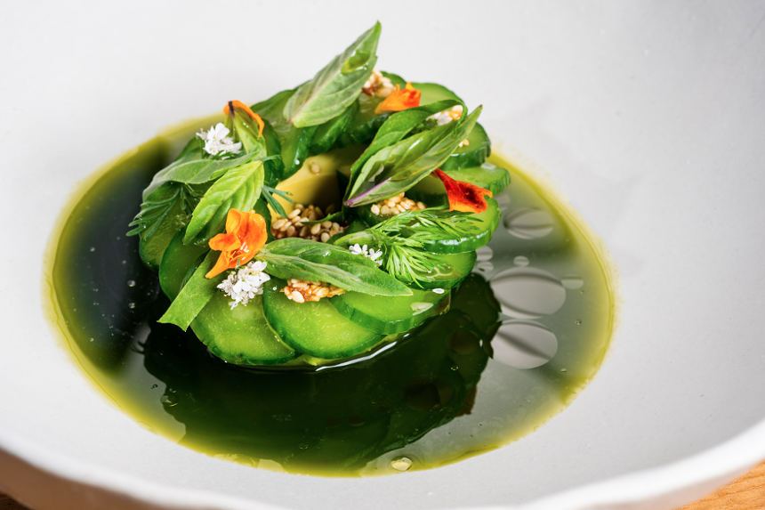 Tía Carmen's avocado aguachile is made with sesame and date crumble, Persian cucumbers and serrano chili. - AUNT CARMEN