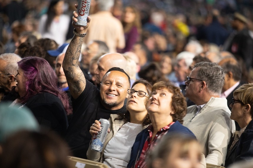 A crowd of people at Chase Field in Phoenix for a Billy Joel concert.