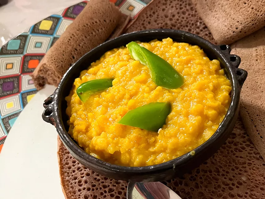 Bright yellow stew at Kare Ethiopian Restaurant.