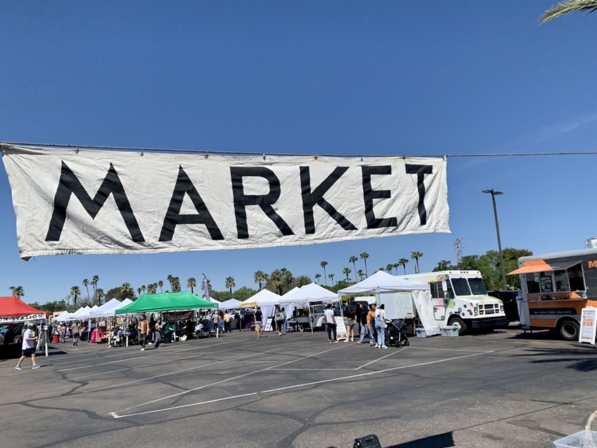 The banner at Uptown Farmers Market.