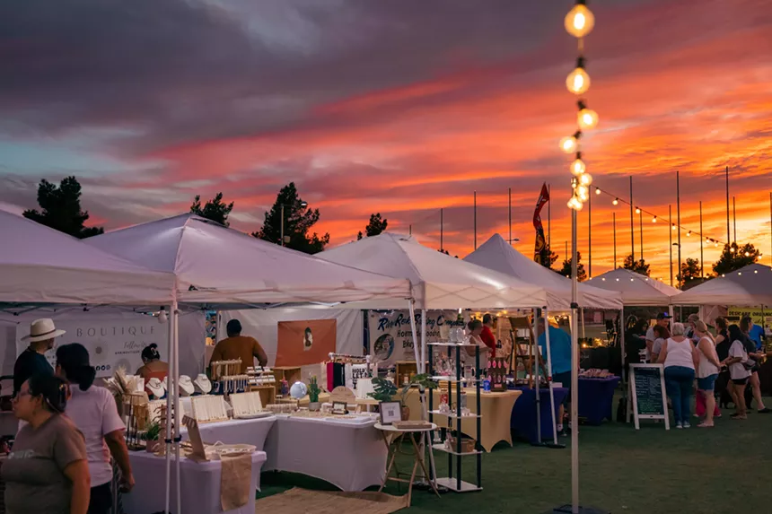 Sunset behind tents at the Heritage Night Market.