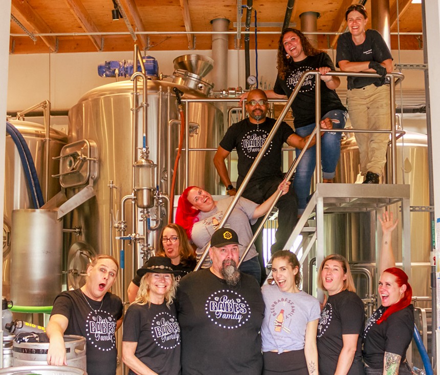 Beer Babes Family brewers pose for a group photo.