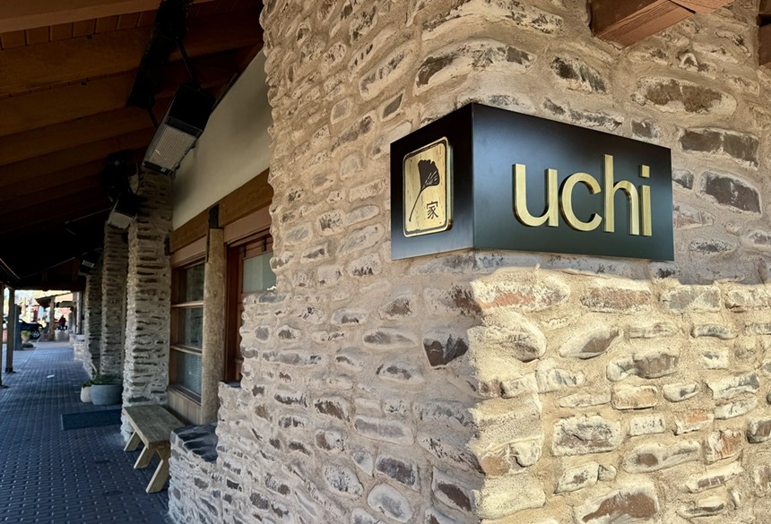 Outdoor sign for Uchi restaurant.