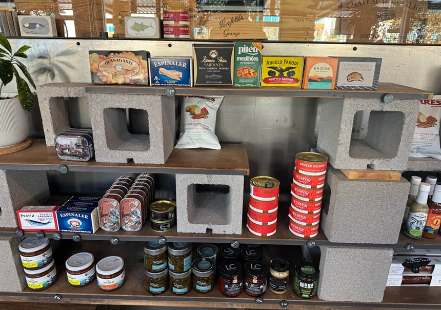 Shelves of tinned fish at Hidden Track.