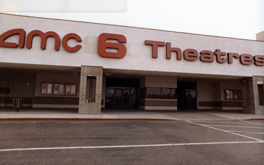 The exterior of a 1980s movie theater.