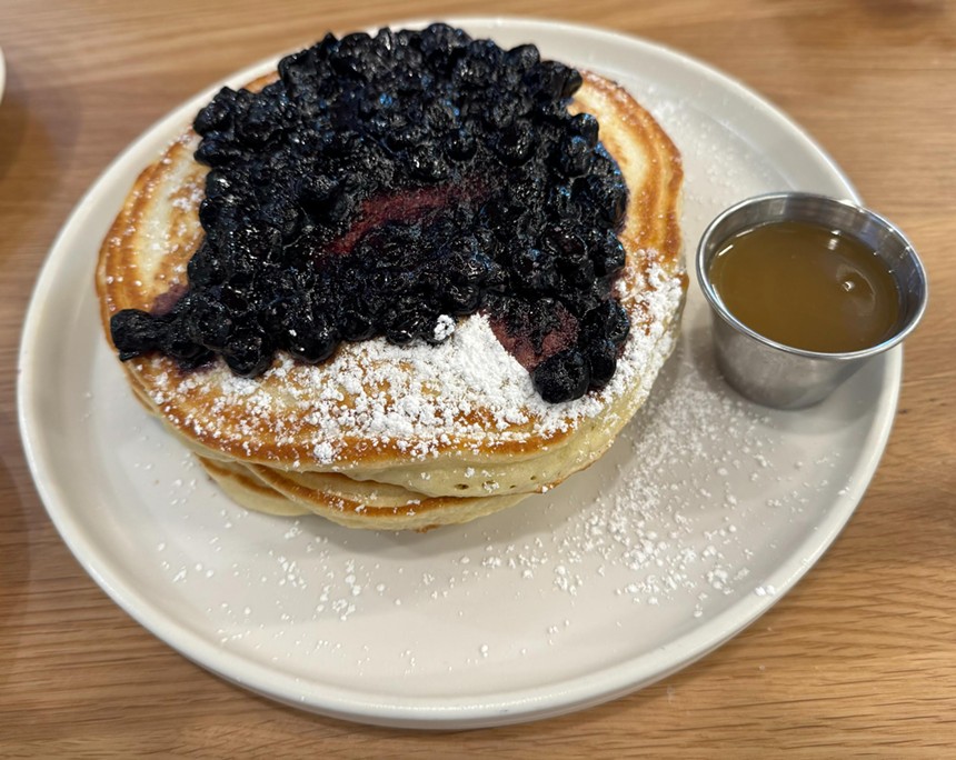 A plate of blueberry pancakes.