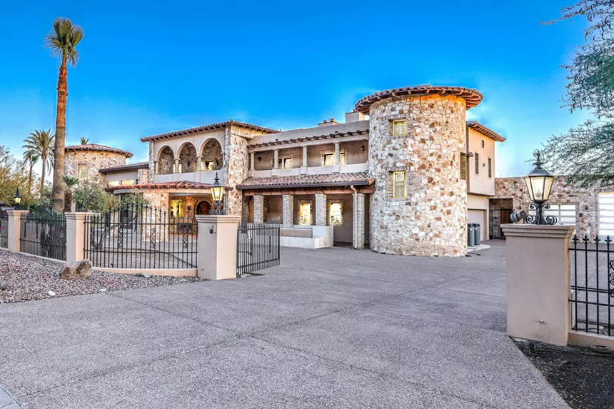 A mansion seen from the driveway.