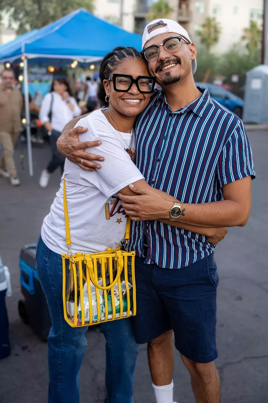 A couple embracing.