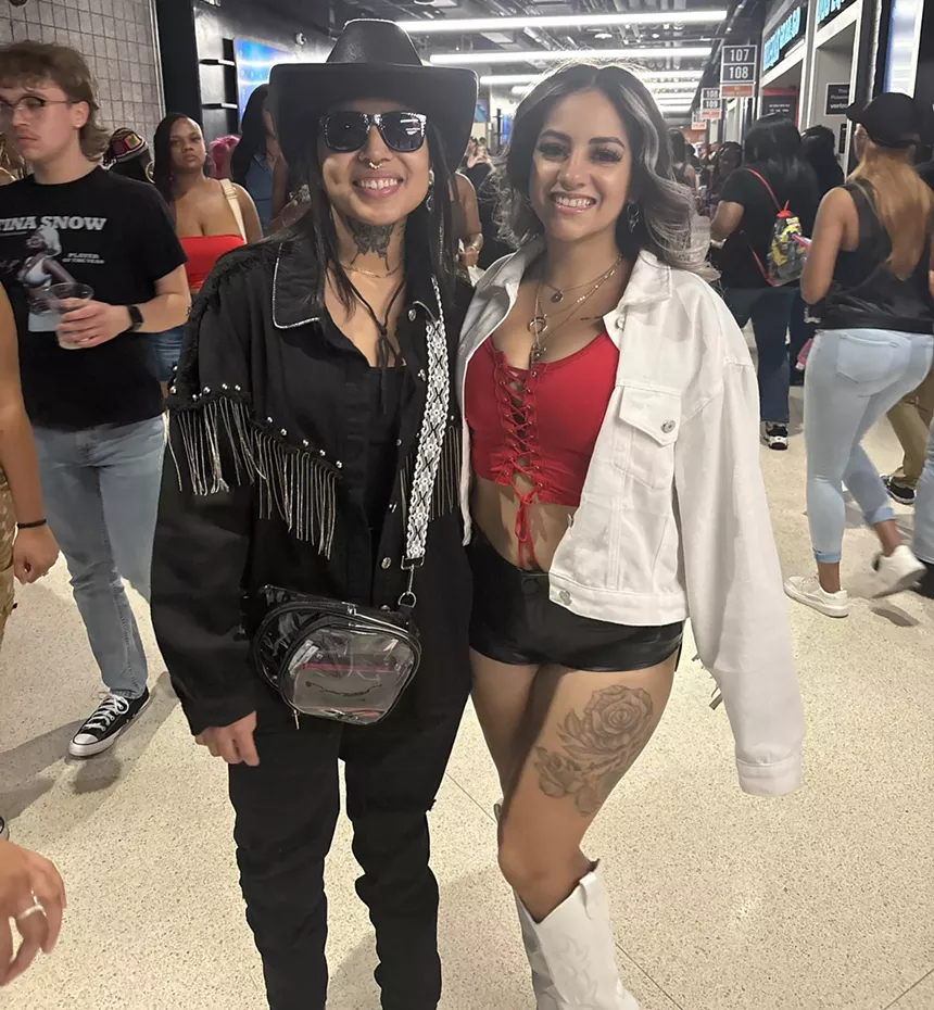 Two women at a concert.