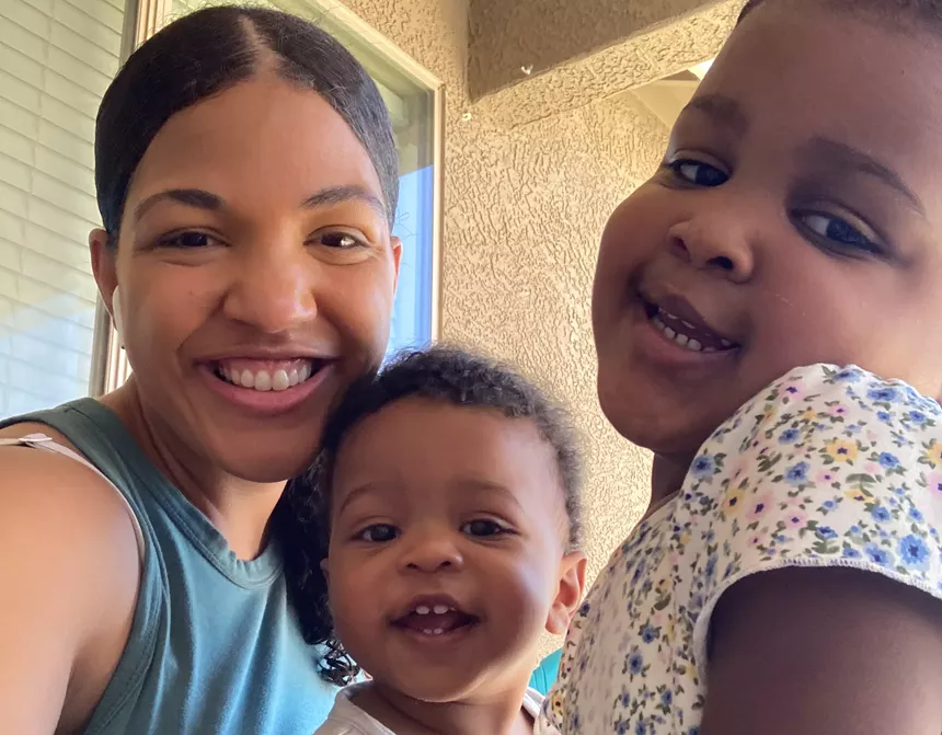 A mother and her two young children